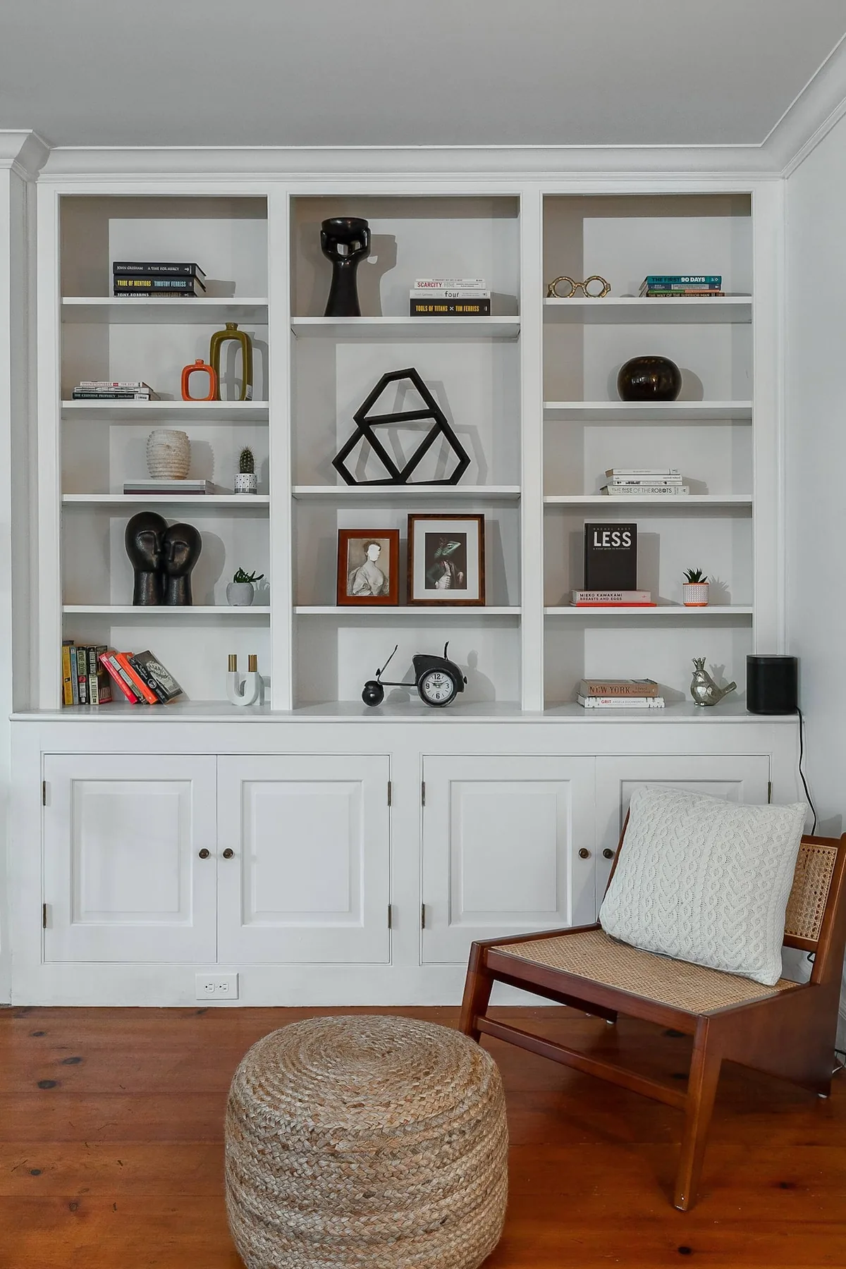 White built-in shelves in a quiet sitting corner